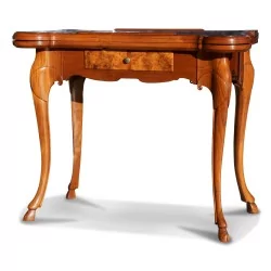 A walnut games table with a "checkerboard" marquetry top and curved legs. Berne.